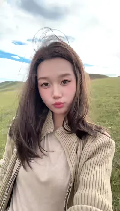 风吹过马丽娟的头发